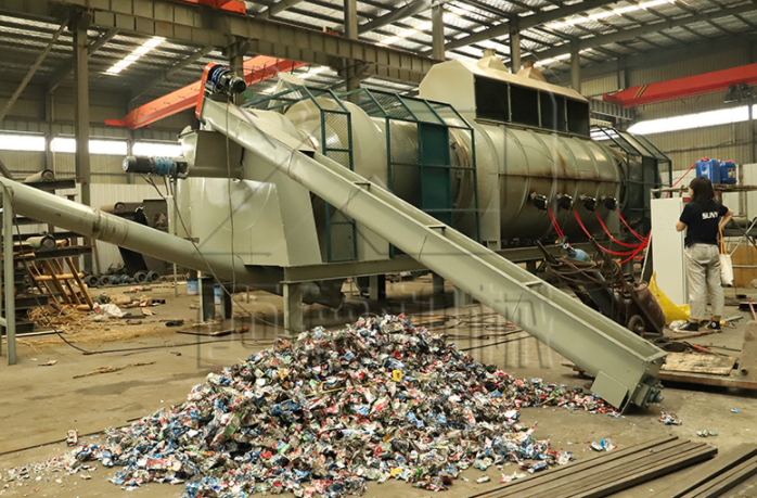 利用連續(xù)式滾筒碳化爐，易拉罐脫漆更便捷